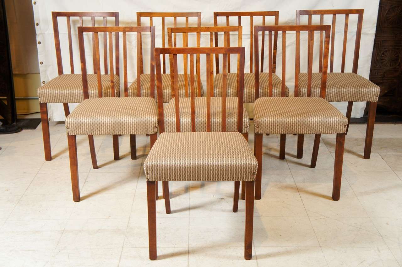 Set of 8 dining chairs in birchwood, with slatted backs, classical style, mid-century Danish modern, with newly upholstered seats
in light grey/green striped fabric