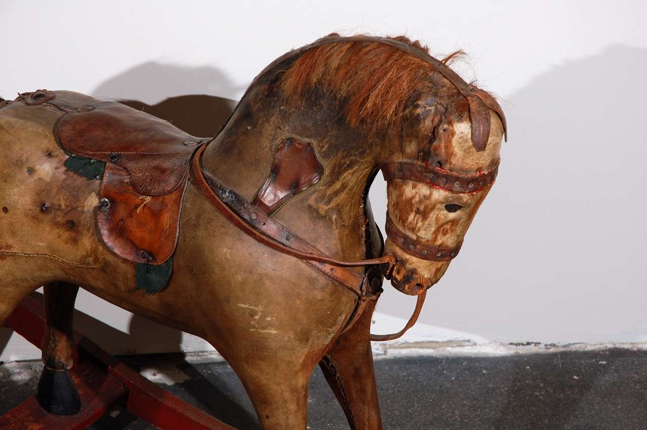 Continental Leather and Horse Hair Rocking Horse In Distressed Condition For Sale In Los Angeles, CA