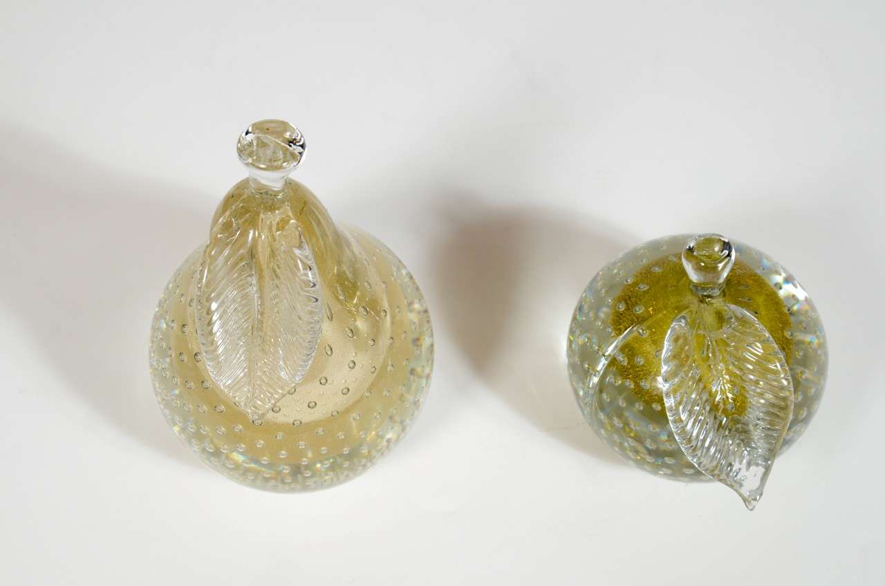 Clear Hand Blown Murano Glass Pear and apple with 24k Gold flecks. Stunning decorative pieces with a solid weight and beautiful clarity.
Pear - 7