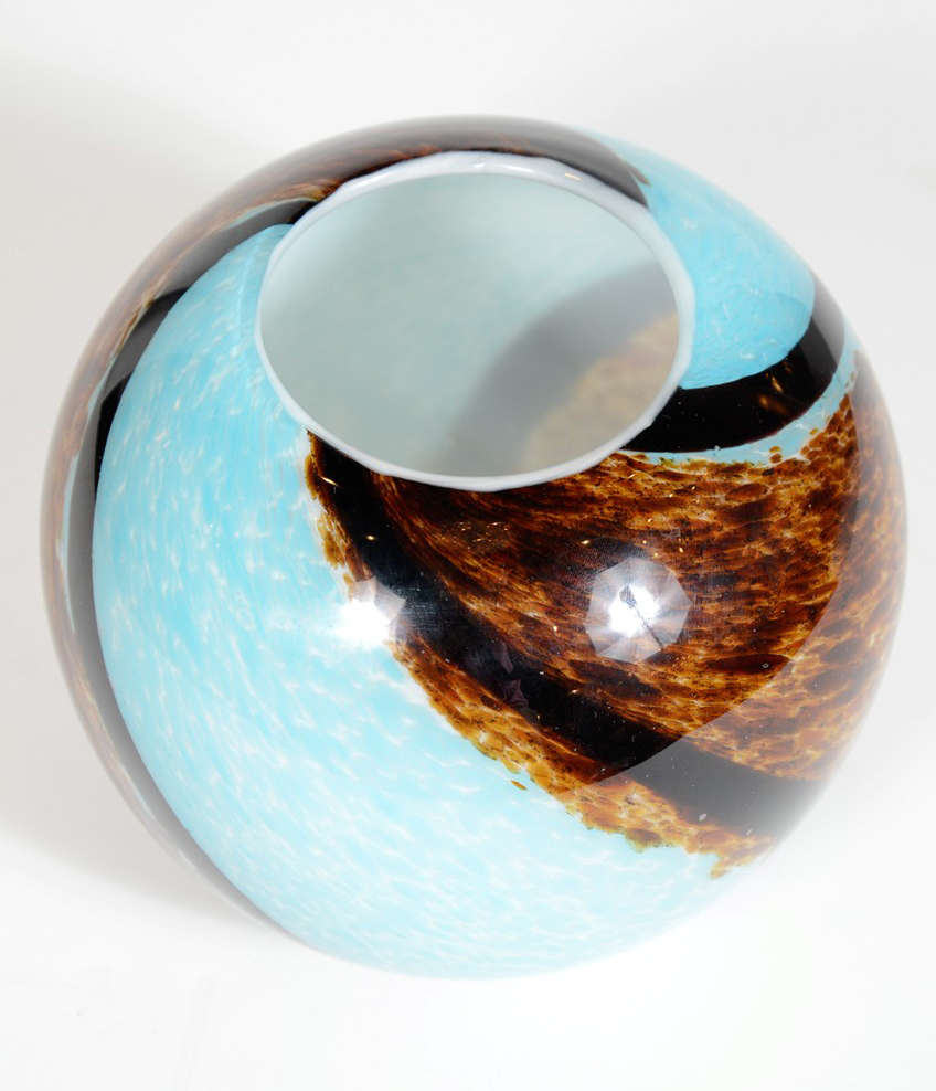 This Mid-Century Murano glass vase has alternating textured earth and cerulean blue tones in a spiral pattern.