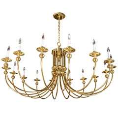 Mid-Century Sixteen Arm Brass Chandelier in the Manner of Tommi Parzinger