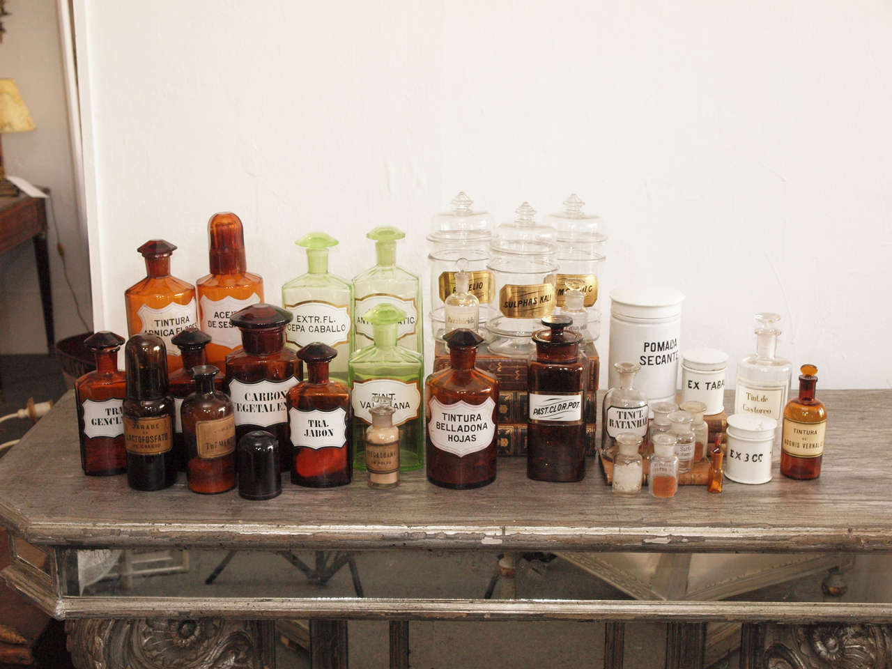 Collection of circa 1900 American and German apothecary bottles and jars.  There are 10 German vessels, ranging in height from 7.5