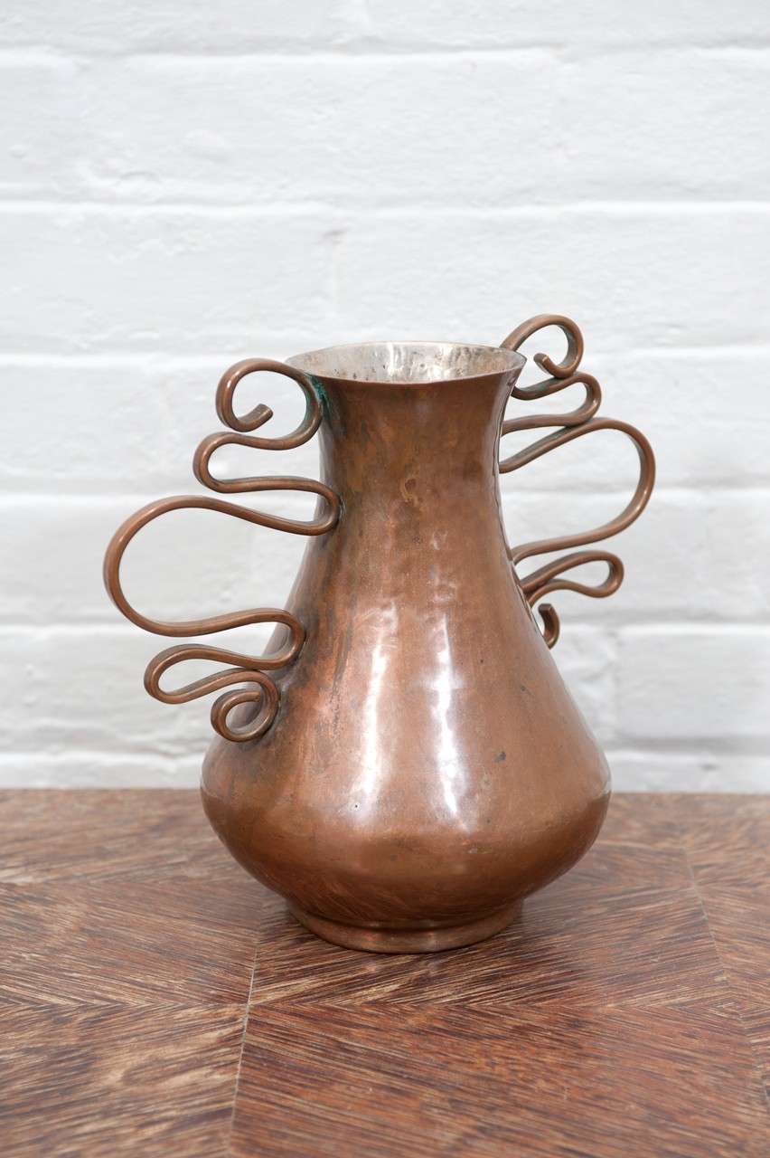 Los Castillo copper vase with silver lined interior.
Signed on base.
