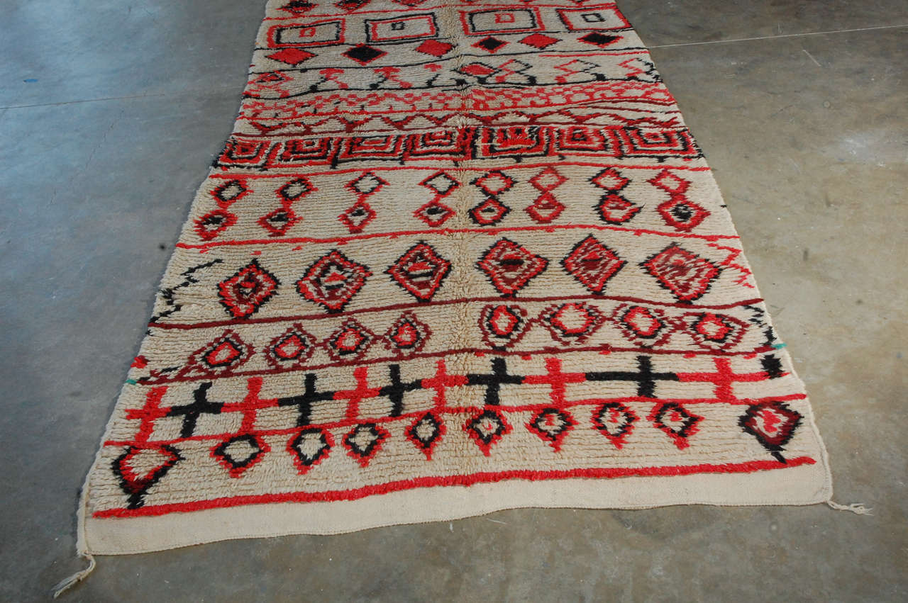 Crafted by women in the interior plains and mountains on fixed-heddle looms, Moroccan rugs can vary greatly depending on the tribes that weave them. Nonetheless, they all use severely geometric Moroccan decoration, sometimes in muted tones,