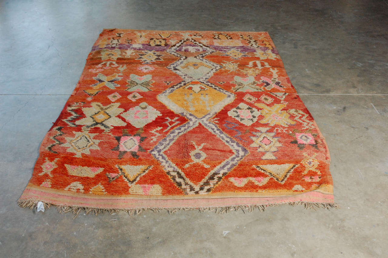 Crafted by women in the interior plains and mountains on fixed-heddle looms, Moroccan rugs can vary greatly depending on the tribes that weave them. Nonetheless, they all use severely geometric Moroccan decoration, sometimes in muted tones,