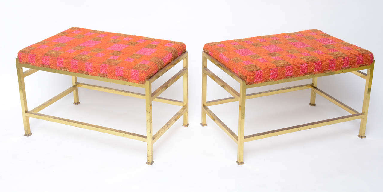 A rare pair of upholstered benches from the Hemisphere collection.  the benches retain their original Dorothy Liebes' hand-loomed fabric.
Dunbar Label below.