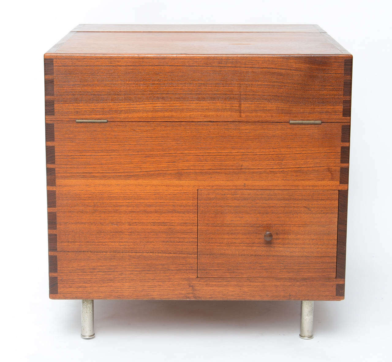 Rare and great design by Hans Wegner.
Bar features one drawer and a hinged top concealing storage.
Signed with branded manufacturer's mark to underside.