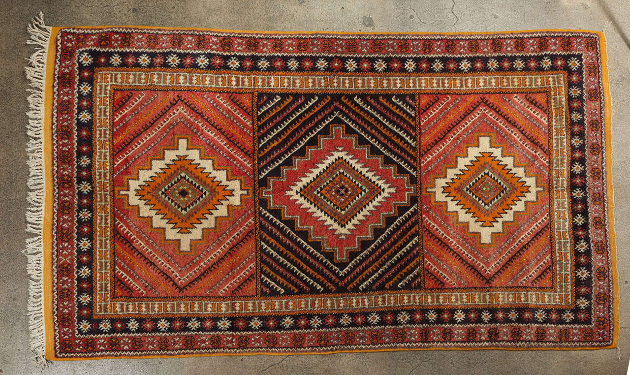 Vintage Moroccan Tribal rug handwoven by Berber women from Morocco.
Great geometrical abstract designs, very modernist carpet.
Vintage Berber rug from the Taznakht tribe in south eastern Morocco. 
Rare piece with beautiful color combination in