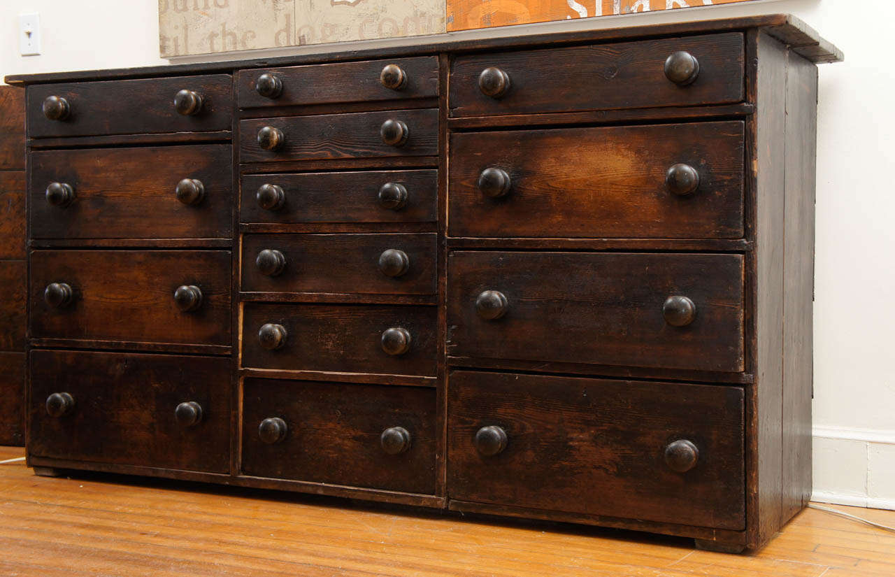 One of our favorite finds is this handsome fourteen drawer English dresser. It dark rich color and large wood pulls are wonderful. We see it in many locations. Bedroom, dining room or family area. It is a gorgeous piece and very very practical.