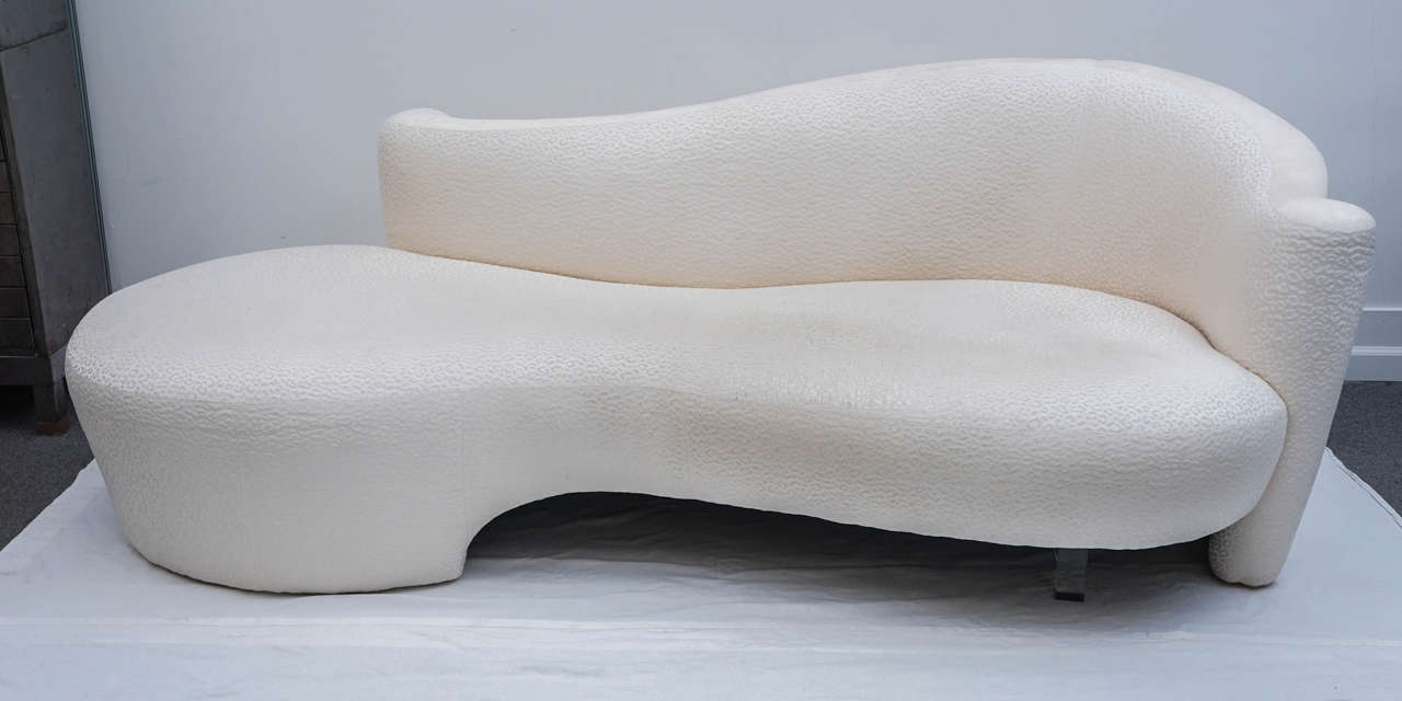 Kagan's famous serpentine sofa. this piece was ordered with a custom lucite leg for added support.
this piece is a very good condition. the fabric on seat does show wear. you could get away with just a cleaning and reupholster just the seat