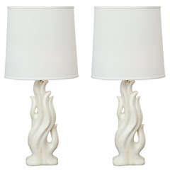 Pair of white alabaster flame lamps