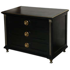 Directoire style chest of drawers with round brass hardware