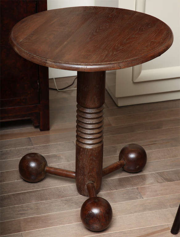 Round oak table with triple ball base, French c. 1940