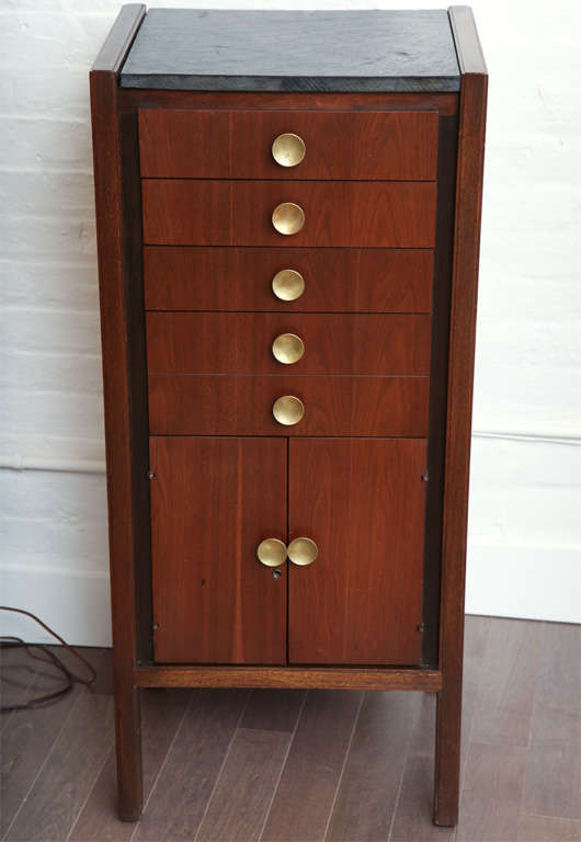 Narrow walnut bureau with large brass hardware, c. 1960