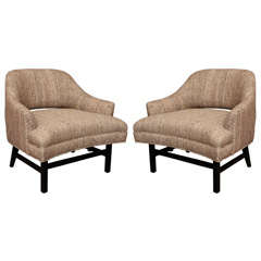 Pair of low upholstered armchairs by Baker, c. 1960