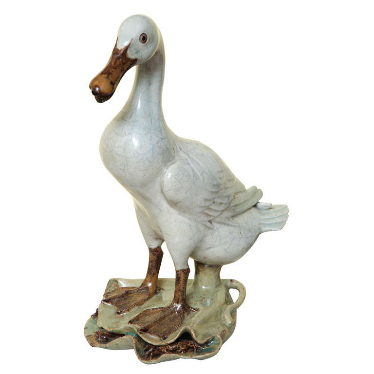 Antique Chinese celadon glazed stoneware duck, 19th century