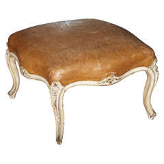 A Louis XV Style Tan Leather and Cream Painted Tabouret