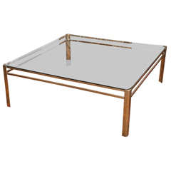 A Brass and Glass Coffee Table in the Style of Maison Malabert
