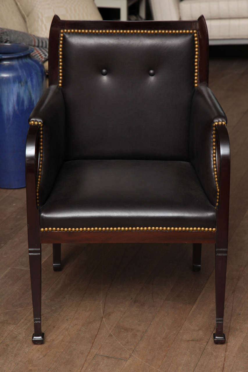 Mahogany Secessionist armchair circa 1900 upholstered in dark brown goat leather with the back panel in Lee Jofa Academy Weave French Twill by Thomas O'Brien