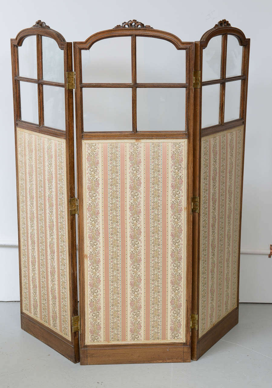 French Louis XVI style triple folding screen with upholstered lower section & clear divided glass in upper portion. Beechwood frame is carved  with various Neo-Classical motifs.  Original restored finish

Originally $ 2,400.00

CHECK OUT OUR WED