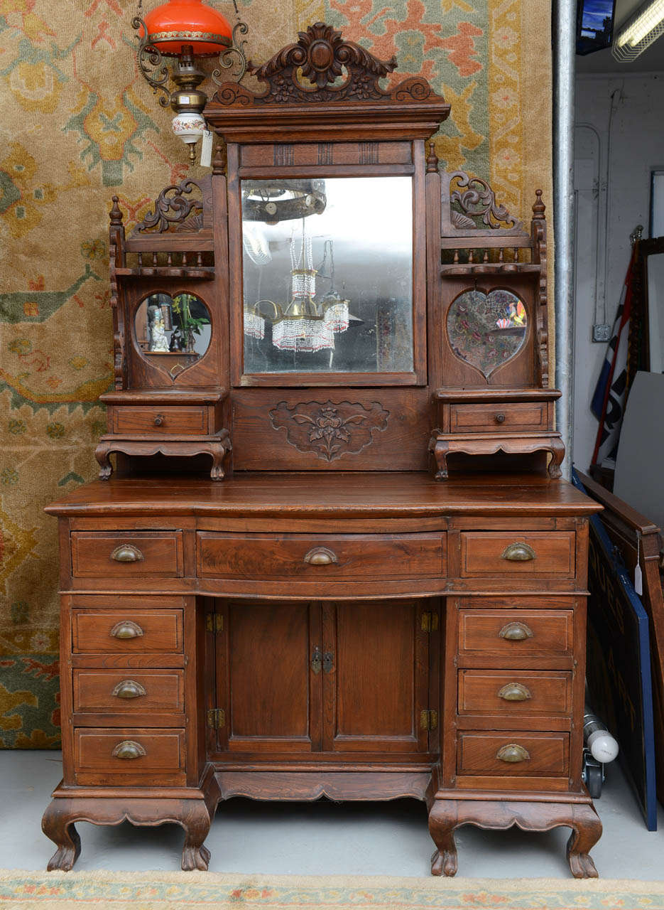 This multi purpose cabinet could be used as a beautiful bathroom vanity with either a vessel set on top or cut in.  It has many drawers for keeping items that may have found a home in an ugly medicine cabinet.  Base cabinet is 33