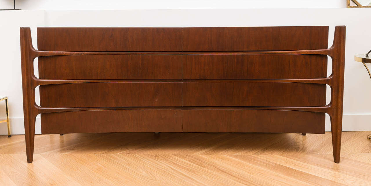 Truly outstanding and rare  walnut chest of drawers by William Hinn for Swedish Guild.   Recently  refinished.