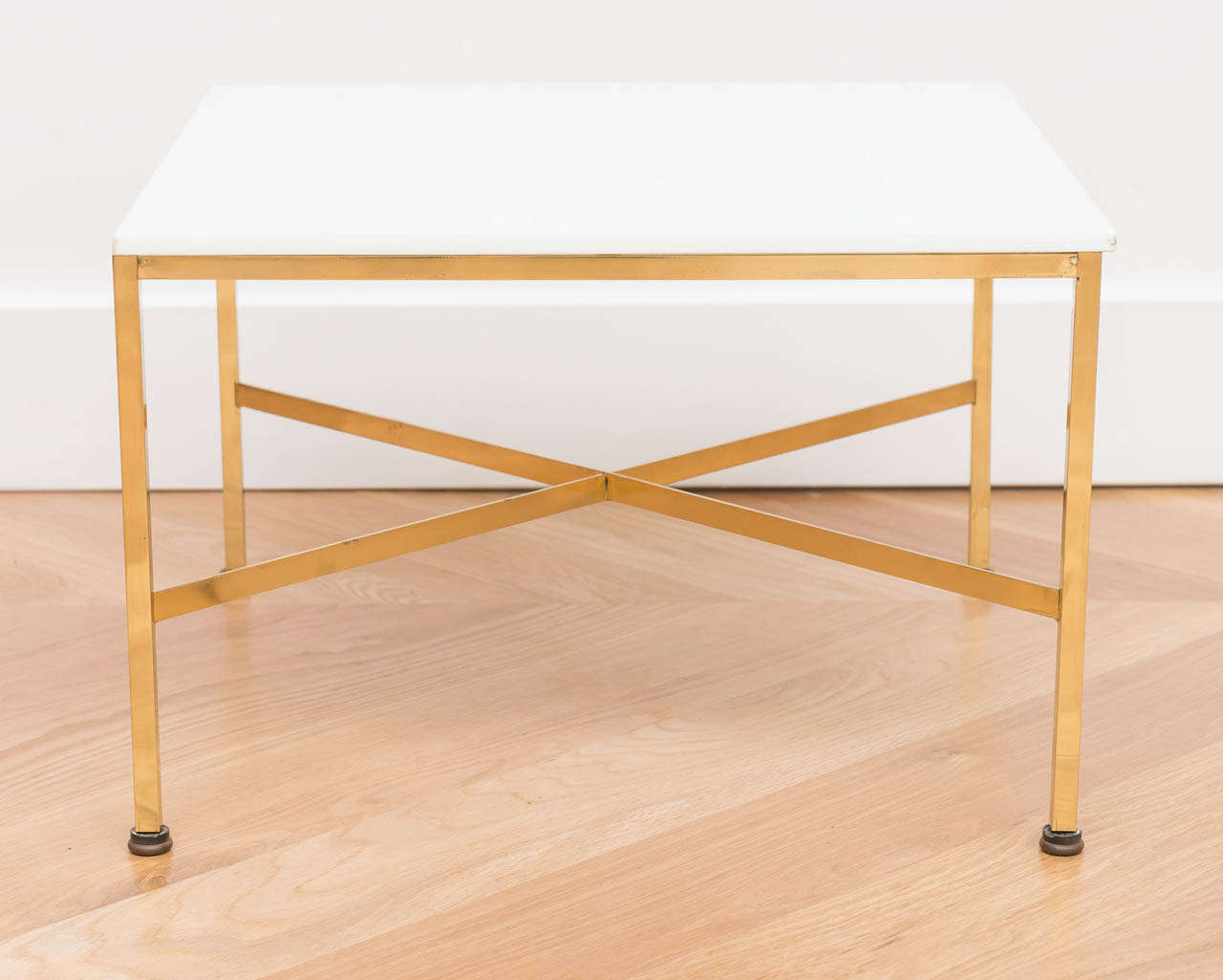 Polished brass and glass P. McCobb side table for Directional.