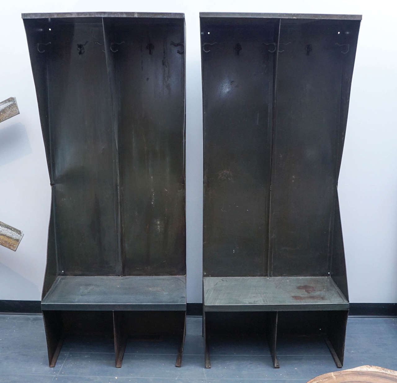 These pair of benches or open lockers create a single longer bench when placed together created from sturdy metal with a dark green finish.
Unique and visually interesting.