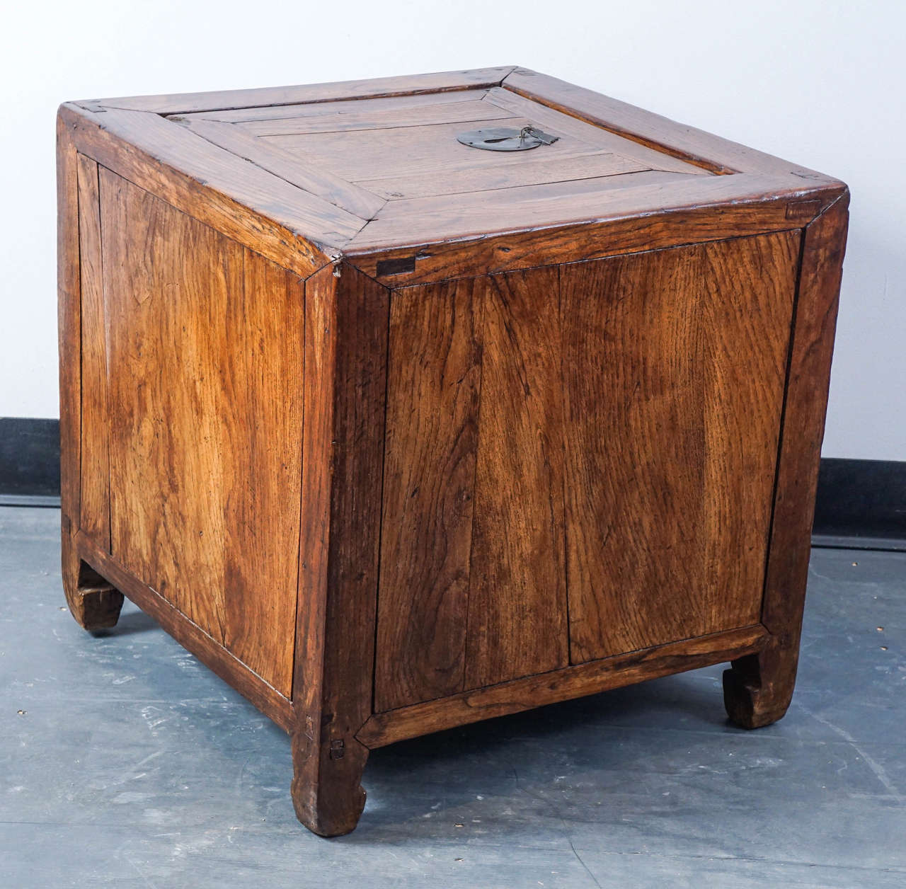 Spare modern form. These boxes created a 100 years ago in Asia were meant for storage. Made from a beautiful elmwood.