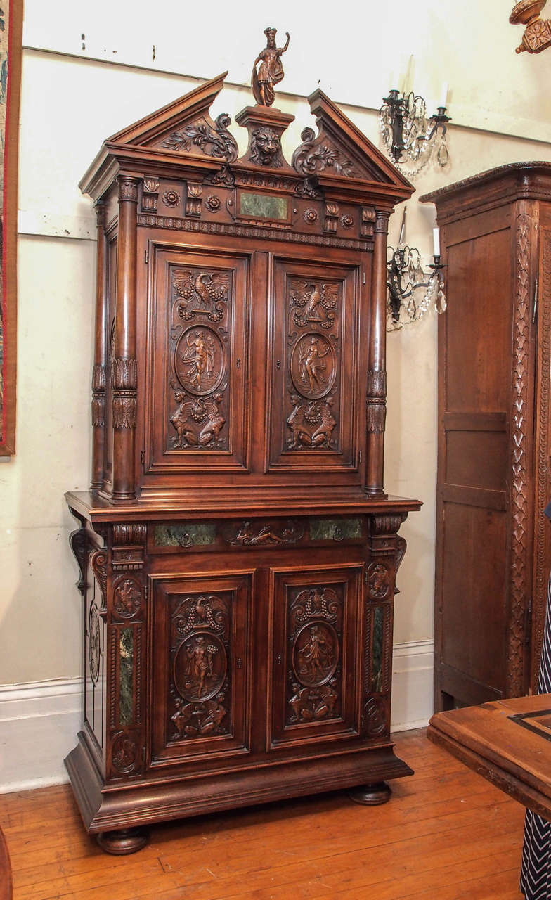 Antique 19th century carved walnut Francois I cabinet. Marble insets.