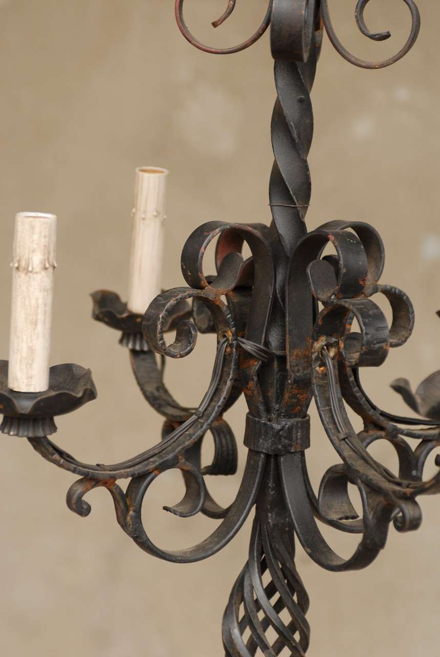 French Vintage FourLight Iron Chandelier For Sale at 1stdibs