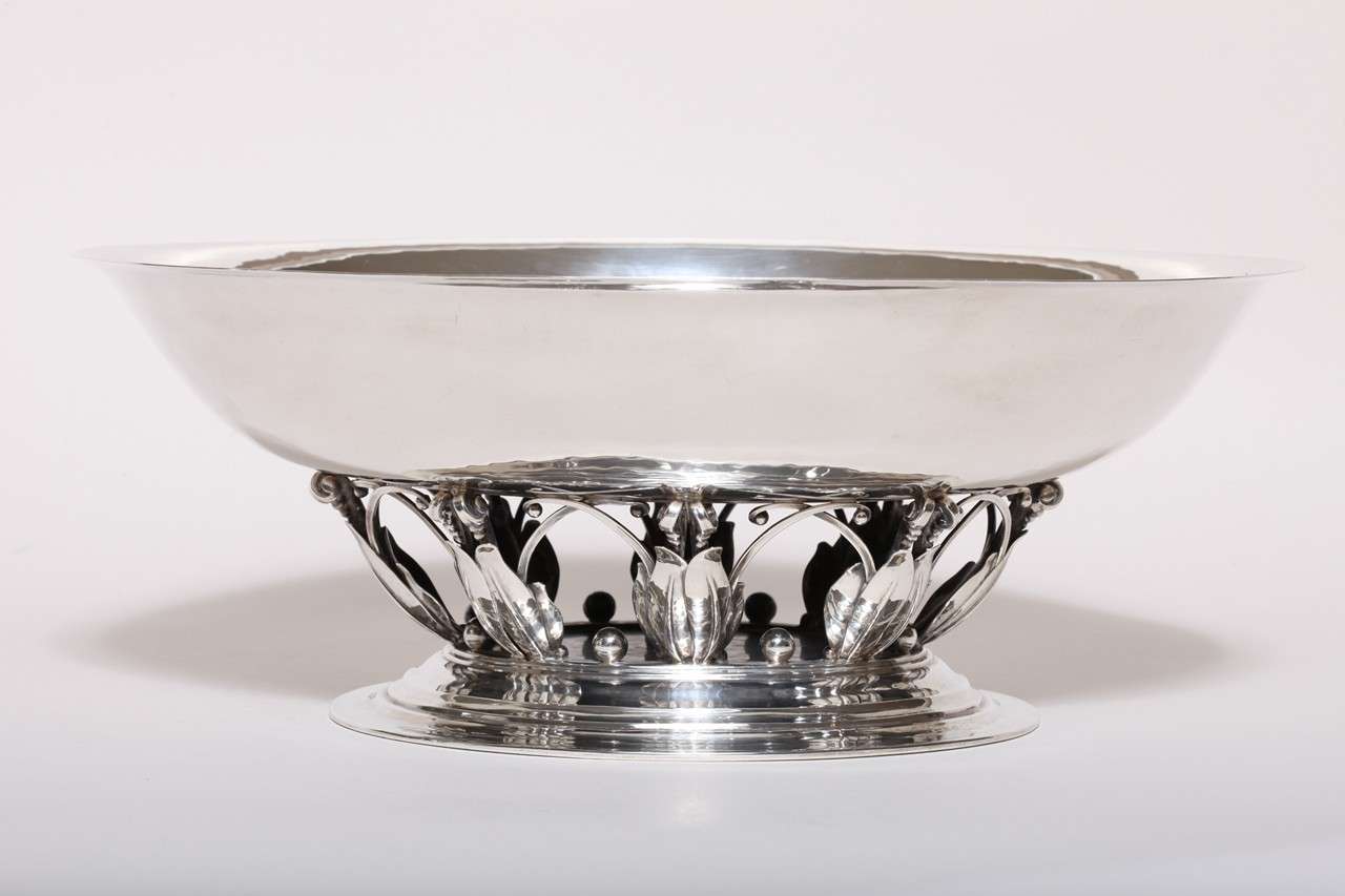 Elaborate silver centerpiece coupe by Georg Jensen.
Hallmarks: 925 sterling silver/ Georg Jensen marks for 1925-1932/ Sterling/ Denmark
Inscribed on base: EDNA STEINHAM ROSENTHAL – 1930.
68.85 ozs.

(Price shown is reduced price, no further trade