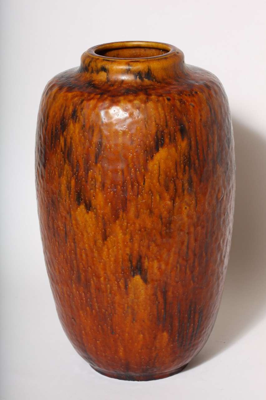 Monumental stoneware enameled vase by Emile Decoeur (1876-1953).
Incised signature: E Decoeur/ 2

Literature:
Fabienne Fravato and Michel Giraud, Emile Decoeur 1876-1953, Editions, 2008, p. 84 for the same decoration on a vase of another