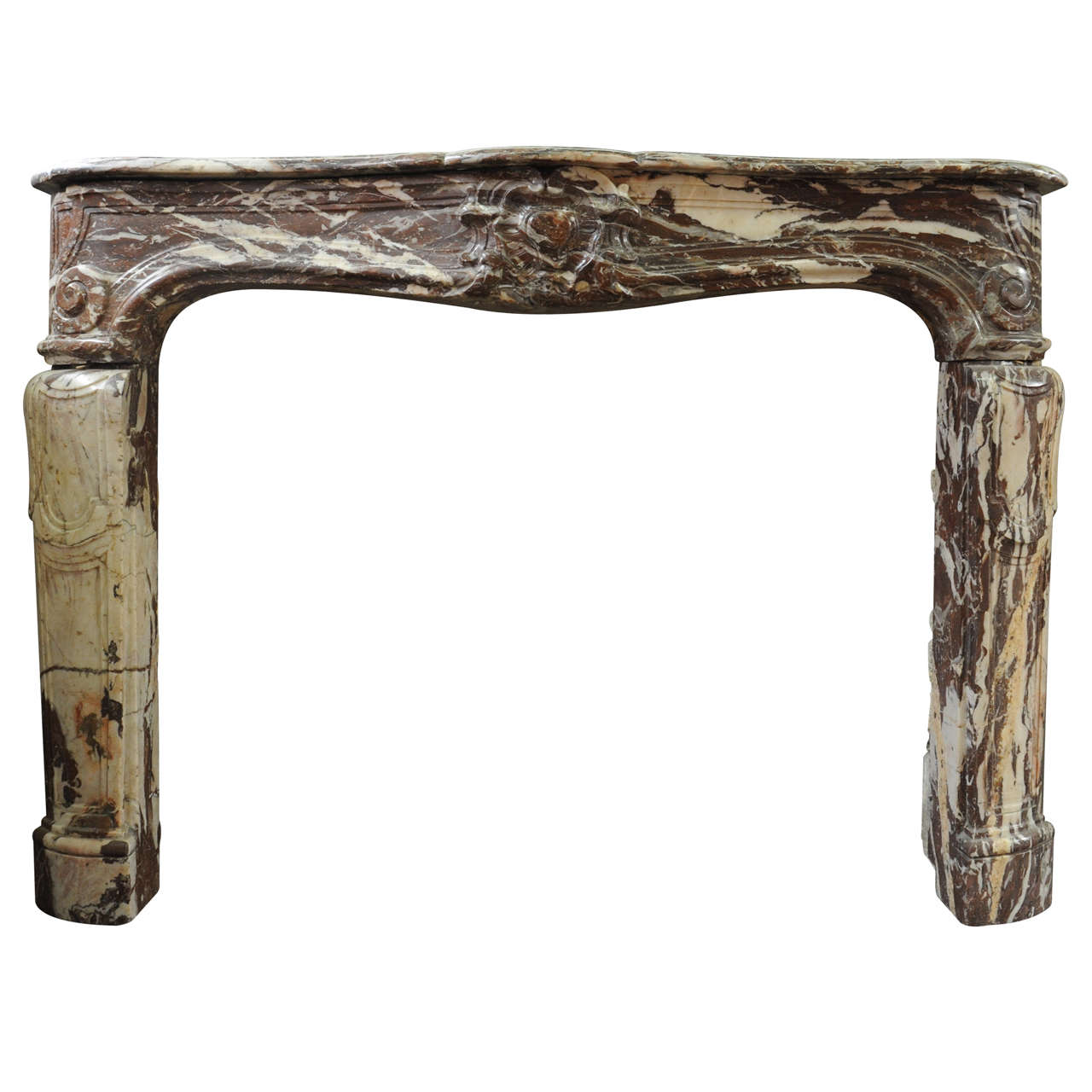 An 18th century French Louis XIV marble fireplace / mantel piece, circa 1730 For Sale