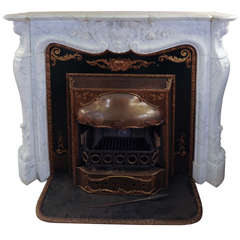 19th C. richly carved Trois Coquilles fireplace