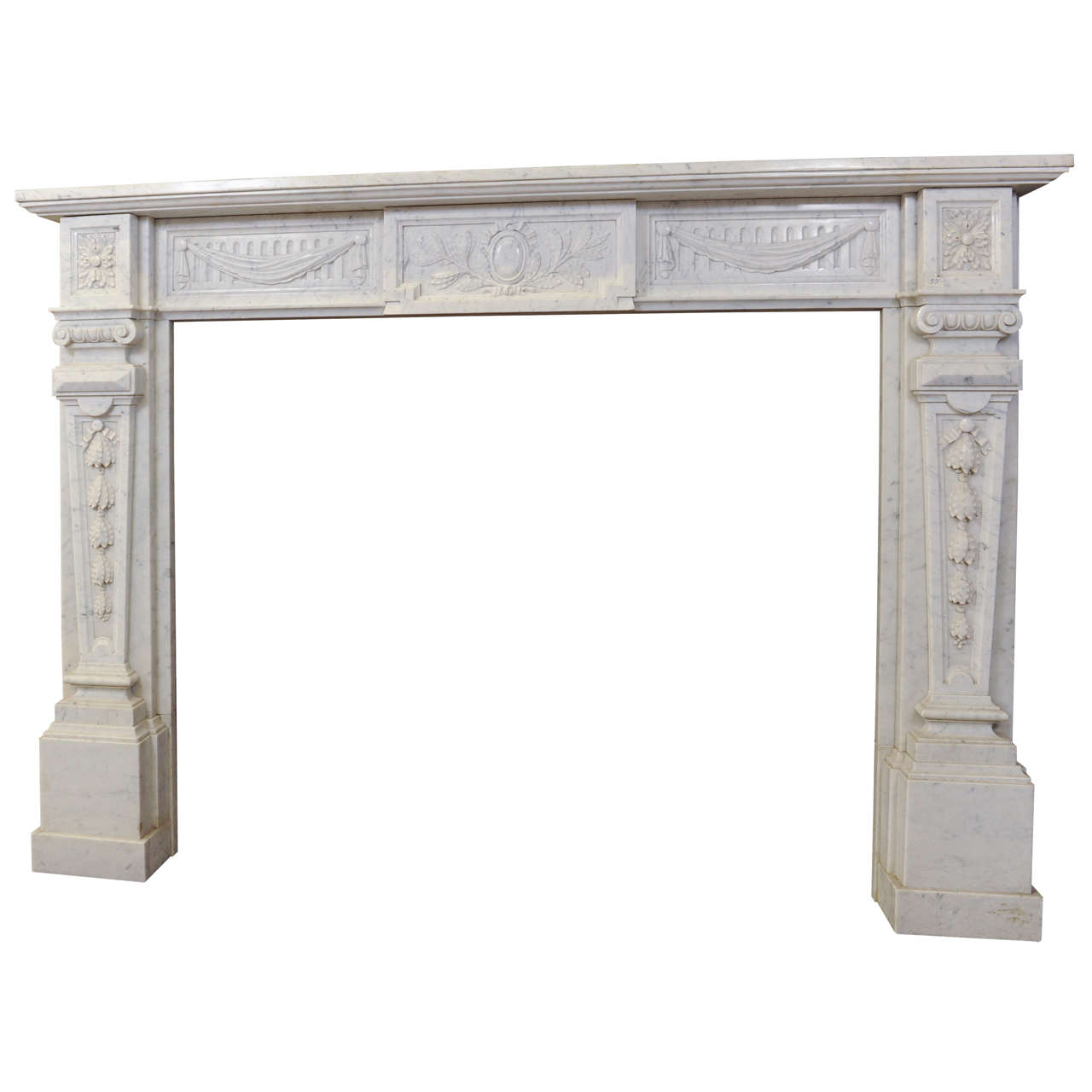 A 19th century French Neoclassical Carrara marble fireplace / mantle piece