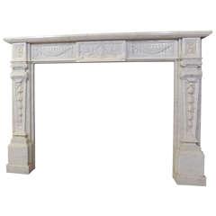 A 19th century French Neoclassical Carrara marble fireplace / mantle piece