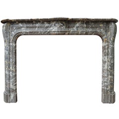 An early 18th C. Dutch Baroque "gris" marble fireplace / mantel piece