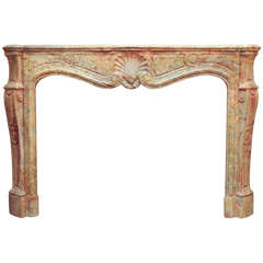 A late 19th C. French Louis XIV style Sarrancolin marble fireplace / mantel piec