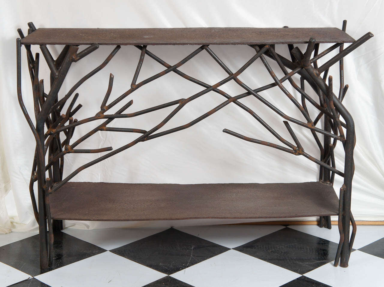 A hand welded Brutalist Steel welded console table in the form of branches with a rust finish