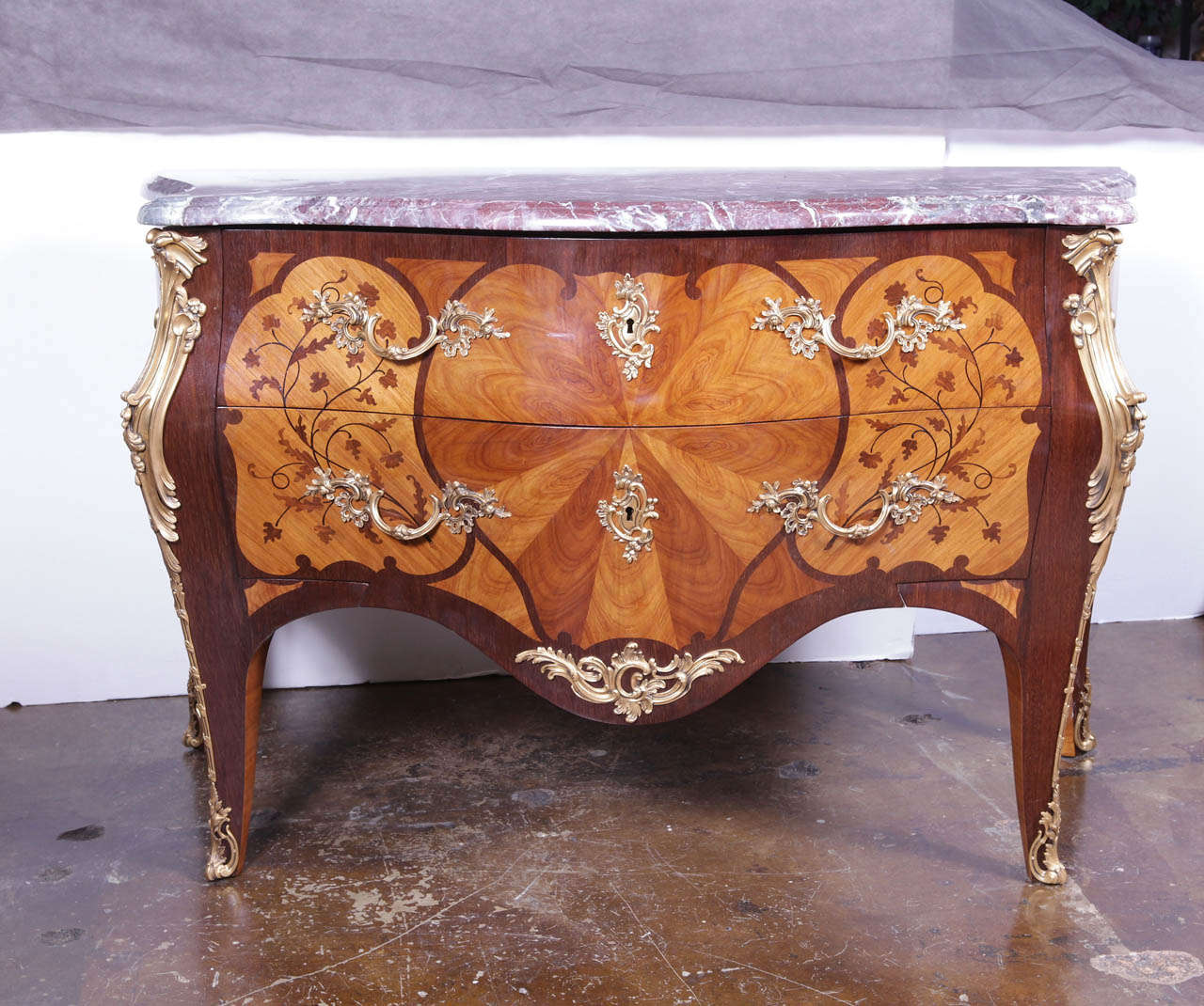 late 19th c French Louis XV kingwood and marquetry inlayed marble topped and gilt bronze commode