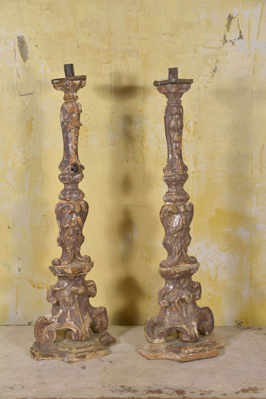 Pair of silvered alter candlesticks.