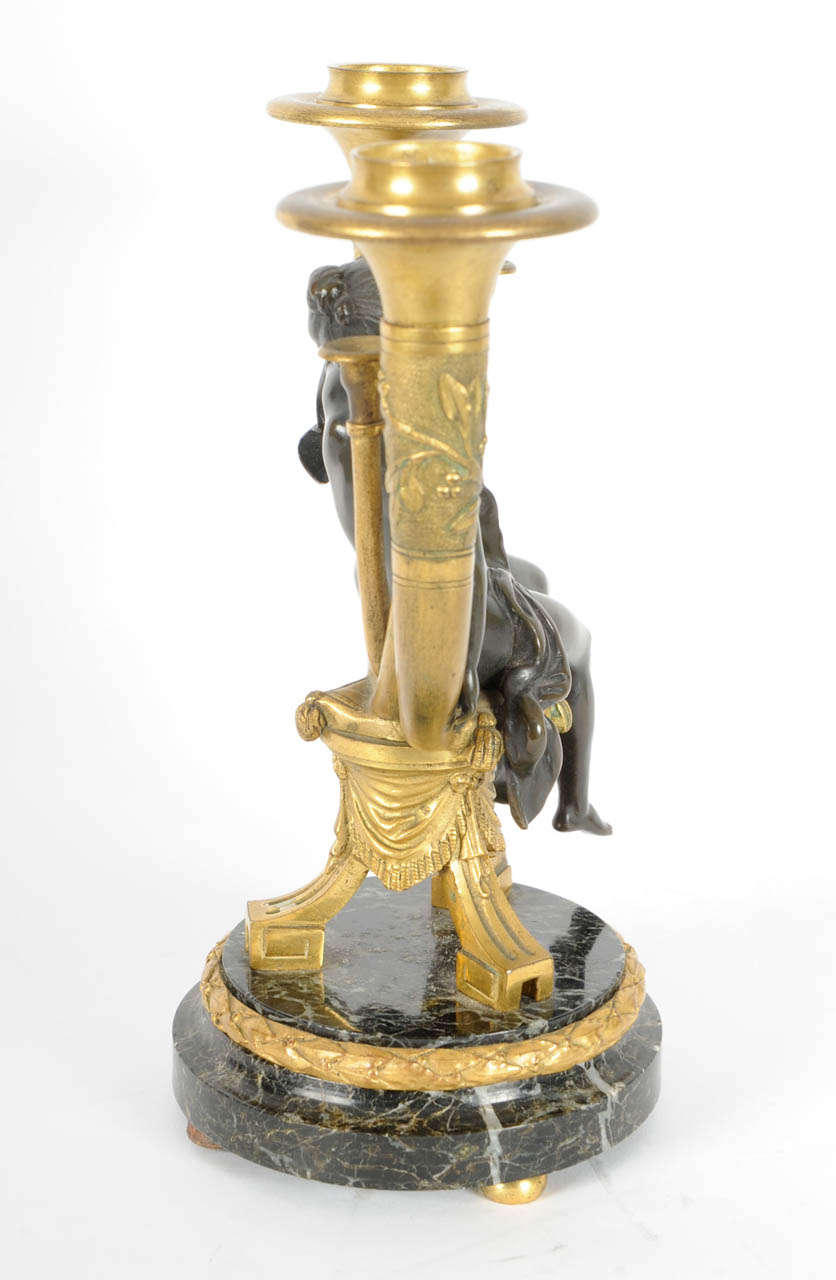 A lovely pair of French ormolu and patinated bronze candlesticks, after Alphonse Giroux, circa 1880 For Sale 1