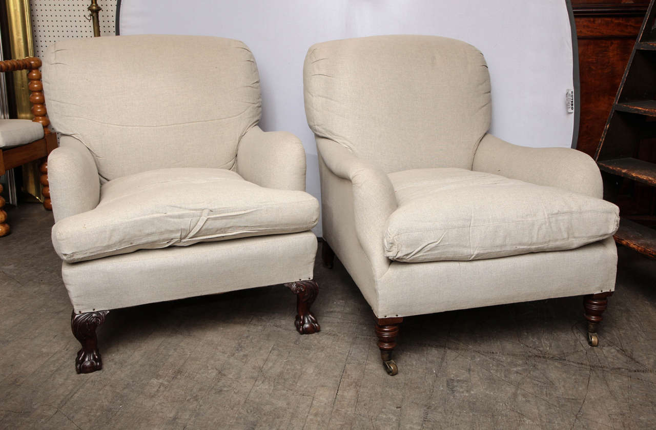 Late 19th C. Armchairs by London area furniture makers.

Notice mismatching chair feet.