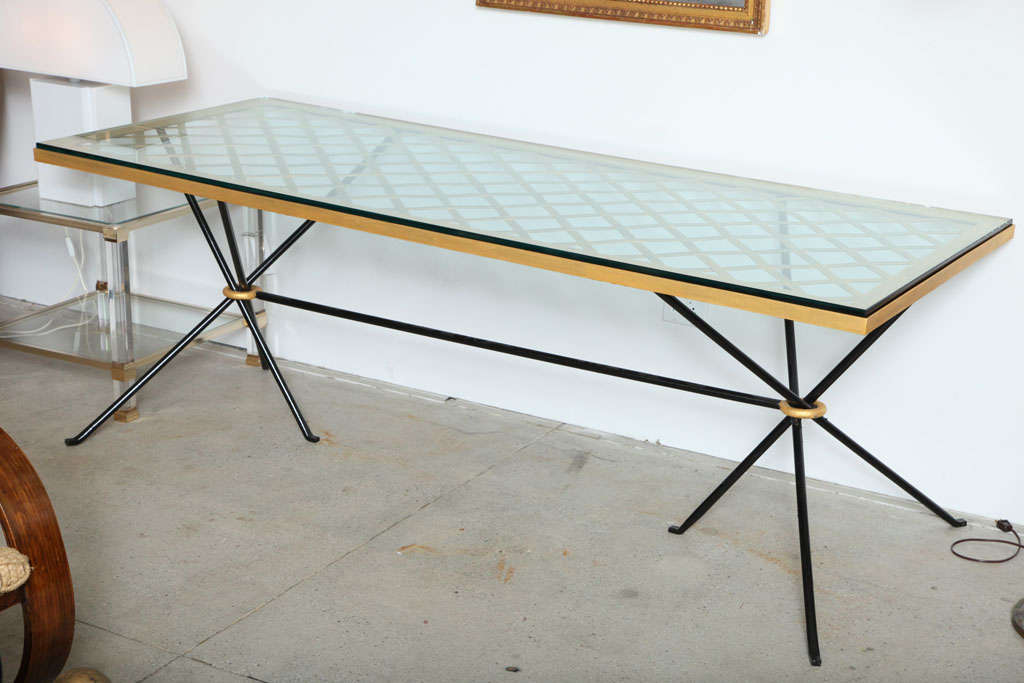 Rectangular table with a gilt iron top with 
