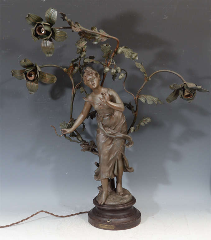 An antique figural white-metal Art Nouveau table lamp entitled 