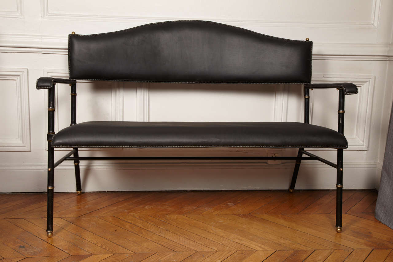 Rare occasional sofa in stitched leather by Jacques Adnet.