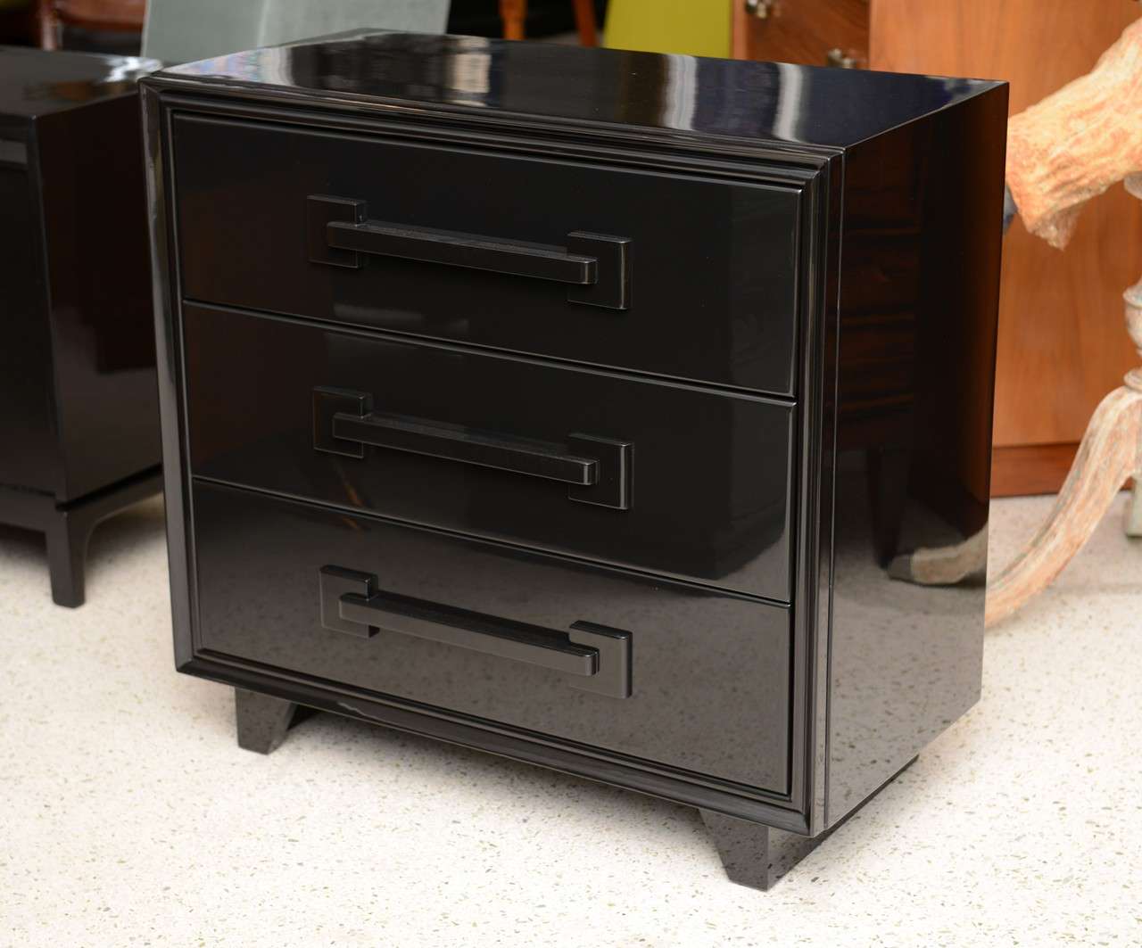 black lacquer chest of drawers