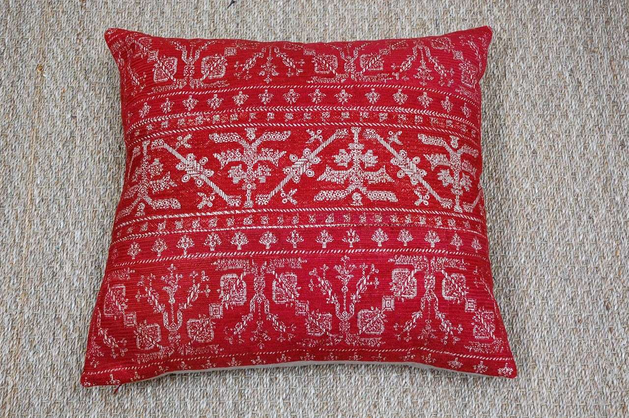 Group of pillows made from 19th C. Moroccan embroidery.  Silk floss on linen backing.  Contemporary natural linen backing.  Feather and down fill. 
Priced individually as follows:
2   20