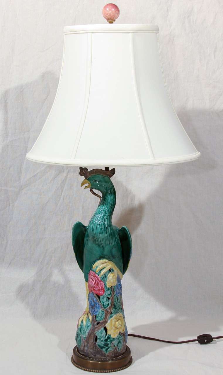 A vintage Chinese porcelain pheasant mounted on a handmade brass base and French mounting.
